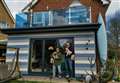Couple win fight to keep cladding on beach-themed house