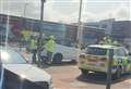 Three-vehicle crash near shopping centre