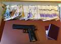Imitation gun, drugs and thousands in cash found in vehicle