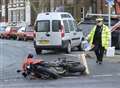 Motorcyclist hurt in crash with taxi