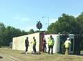 Lorry overturns on A20