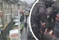 Two arrests after armed police shut road