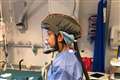 Proud husband posts pictures of consultant wife in full PPE