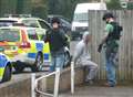 Pair bailed after firearms arrest as armed police surround house