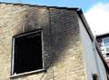 Arson charge after pensioner rescued from flat fire