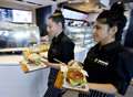 Waiters at the ready for McDonald's table service