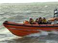 Lifeboat crews race to capsized dinghy