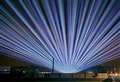 Massive laser show lights up night sky