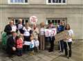 Families campaigning for threatened Sure Start centres hand over petition 