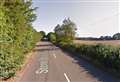 Two injured and road closed after crash