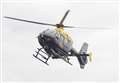 Helicopter joins search for 'armed man'