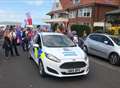 Police defend pride branded cars