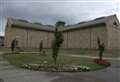 Inmate bit prison officer in dressing gown row