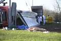 Meat strewn across road after lorry overturns