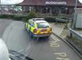 Lazy cop parks on double yellow lines to grab McDonald's