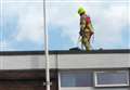 Firefighter 'saves' dangling man