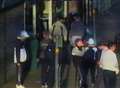 Hunt for gang in attack on students