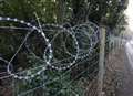 Man puts up 'Auschwitz-style' fence to keep thieves out