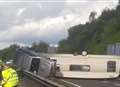 Overturned caravan causes M25 delays