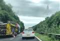 Bus fire partly blocks A2