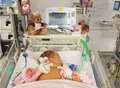 Family gives back after hospitals save baby's life