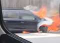 Burning car causes motorway delays