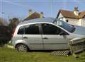 Slipper slip-up as elderly driver slams car into garden