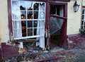 Man arrested after car crashes into pub