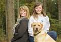 Woman who trains dogs to sense diabetes problems gets Xmas treat