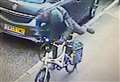 Hooded thief caught on CCTV stealing bike