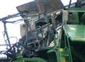 Fire engulfs field and combine harvester
