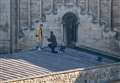 Couple get engaged on cathedral roof
