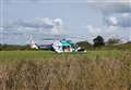 Air ambulance lands in field