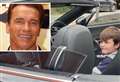 Youngsters enjoy playing in 'Arnie' super car