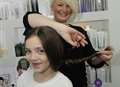 Real-life Rapunzel has hair cut for charity