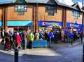 Bargain hunters queue for brr..and new store 
