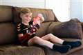 Boy born without a hand gets to grips with new ‘robot arm’