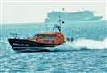 Lifeboat crew rescue three trapped by tide