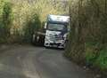 Car overturns after lorry crash