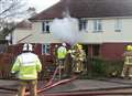 Fighting breaks out as crews tackle blaze at family home