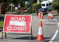Road closed after surface gives way