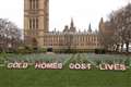 Activists erect ‘headstones’ by Parliament to highlight deaths from cold homes