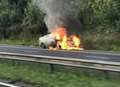 Crews tackle motorway car fire