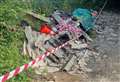 Asbestos dumped in lane not cleared after two weeks