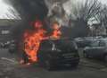Midday car fire in town car park