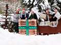Santa boards carpenter’s eco-friendly pallet sleigh 