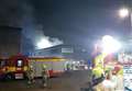 Firefighters tackle huge warehouse blaze