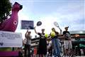 Climate activists protest against Barclays’ sponsorship outside Wimbledon gate