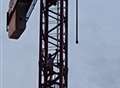 Police called after man threatens to jump from crane
