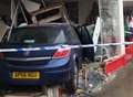 Police appeal after car ploughs through shop window